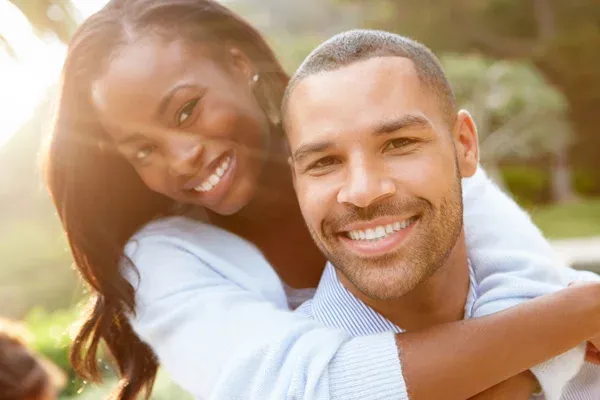 Bioidentical Hormone Replacement Therapy Happy Couple Smiling Outdoors
