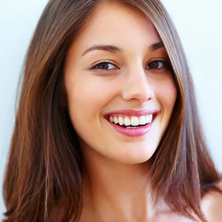 Woman With JUVÉDERM Lip Fillers Smiling