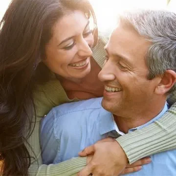 Happy Middle Aged Couple Embracing